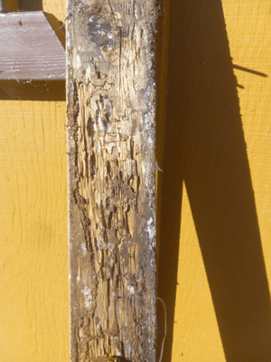 A wood plank with a metal post

Description automatically generated with medium confidence